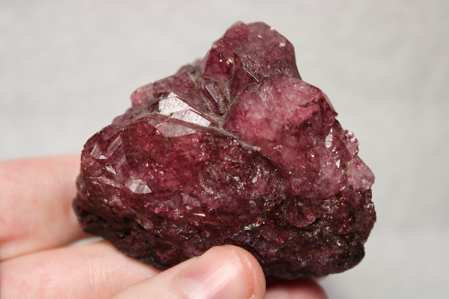 Rough purple-red crystal cluster.